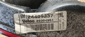 Lampa zderzaka lewy tył tylna lewa Opel Corsa C 24409337 89304951 6