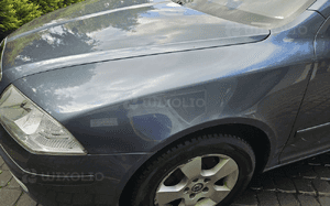 Skoda Octavia II 2 błotnik przód przedni prawy  9901 4