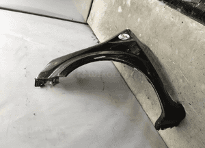 Błotnik przód przedni lewy renault modus NV676 czarny 2