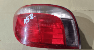 Lampa lewa tył tylna toyota yaris i 1 hb 1