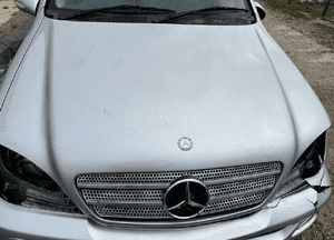 Mercedes ML 163  maska srebrna 744 pokrywa silnika grill zamek 4