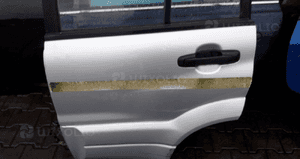 Suzuki Grand Vitara 04 drzwi tyl tylne  lewe 2