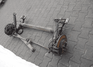 OPEL ASTRA IV J OŚ BELKA ZAWIESZENIE TYŁ 5X115 3