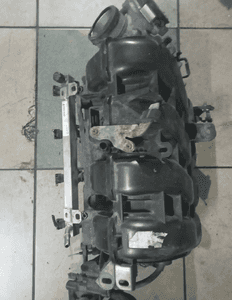 kolektor ssący corsa d 1.4 16v a14xer 55563664 1