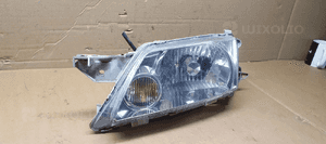 Lampa lewy przód przednia lewa Mazda Premacy 4