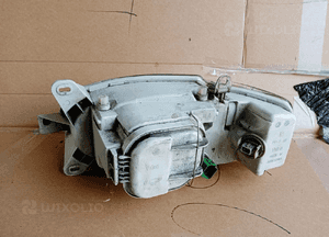 Lampa prawy przód przednia prawa Ford Escort MK7 2