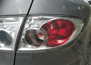 Mazda 6 03 GG lampa tyl tylna w blotnik lewa 5D 4