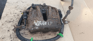 Zacisk hamulcowy lewy przód przedni Land Rover Discovery III 2