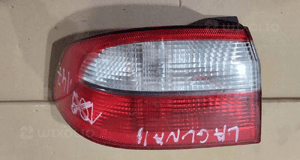 Lampa lewa tył tylna w błotnik renault laguna ii hb sedan 3