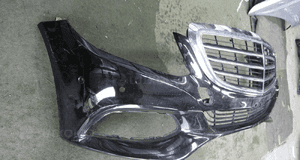 Mercedes 205 z grilem bdb zderzak przedni 2