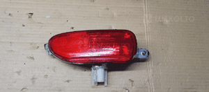 Lampa zderzaka lewy tył tylna lewa Opel Corsa C 24409337 89304951 1