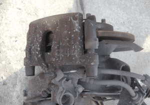 Mazda III 3 zacisk hamulcowy prawy lewy tyl 03-09 2