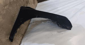 Błotnik przód przedni prawy toyota avensis T25 lift  209 2O9 czarny 2