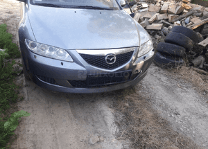 Mazda 6 02-07 Maska lampa zderzak pas atrapa 29Y 3