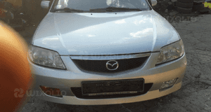 Mazda 323 323f BJ 98-00  Maska lampa zderzak pas atrapa 22V 10