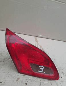 OPEL ASTRA J HB Lampa tył lewa w klapę 1