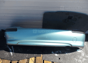 NISSAN ALMERA N16 ZDERZAK TYŁ TYLNY BY4G 1