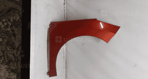 * BŁOTNIK PRAWY PRZEDNI PEUGEOT 308 08-13r. POMARAŃCZOWY 1