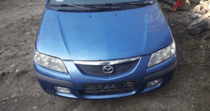Mazda Premacy Maska lampa zderzak pas atrapa 4Y 1