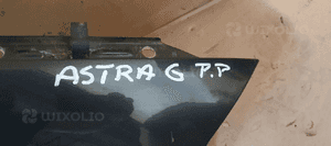 Błotnik prawy przód przedni prawy Opel Astra G 6