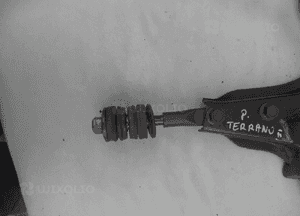 WAHACZ PRAWY PRZÓD  ŚRUBA WSPORNIK NISSAN TERRANO II MAVERICK 2