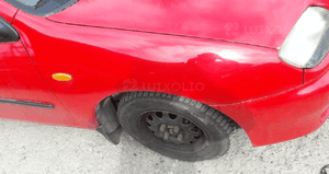Mazda 323 323C BA Błotnik przedni Prawy SU 3