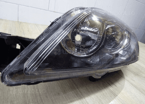 lampa lewa przód TYC Mazda 3 20-a860 2