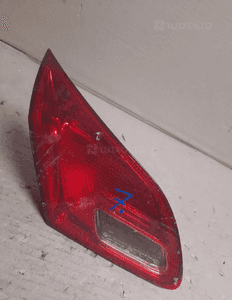 OPEL ASTRA J HB Lampa tył lewa w klapę 1