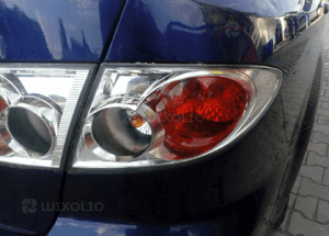 Mazda 6 03 GG lampa tyl tylna w blotnik lewa 5D 3