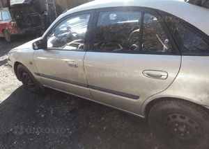 Mazda 626 GF 97-02 Drzwi przedni przód Lewy 4f 3