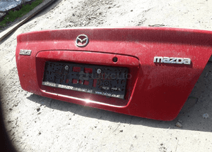 Mazda 323 s bj 98-03 Klapa tylna tył SEDAN 5
