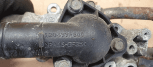 Magistrala króciec wody obudowa termostatu Nissan Almera 1.5 16V 130499F600 6