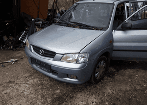 Mazda Demio Błotnik przód przedni  Prawy lift w kolor 18G 22V 5