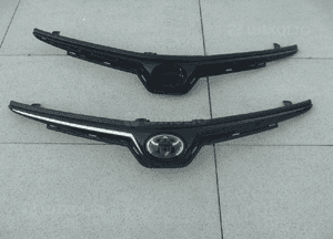 Toyota corolla E21 sedan atrapa zderzaka znaczek oryginał 1
