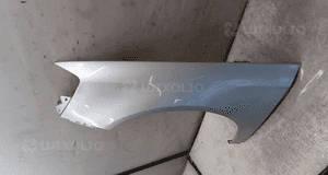 * BŁOTNIK LEWY PRZEDNI PRZOD DO VW PASSAT B6 LA7W SREBRNY 2