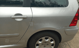Peugeot 307 blotnik tyl tylny lewy prawy  SW kombi 6