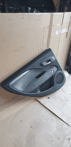 Tapicerka boczek drzwi lewy tył tylna lewa Fiat Punto EVO 3