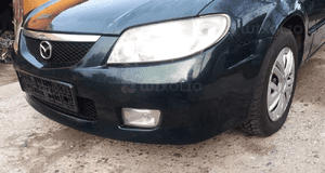 Mazda 323 323f BJ 98-03 Lift  Maska lampa zderzak pas atrapa 18J 3