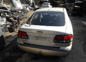 Mazda 626 GF 97-02 HB Klapa tylna tył z szyba 4F 1