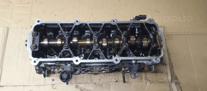 Głowica silnika kompletna wałek Audi A4 B6 1.6 06B103373T 1