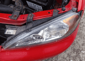 Primera P11 99 01r lewa lampa przód 2
