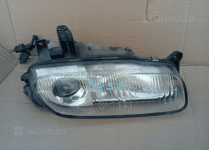 Mazda 323F lampa przod przednia prawa lewa 95-98 1