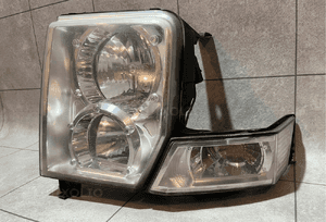 JEEP COMMANDER XK XH LAMPA LEWA ORYGINAŁ UK BDB 9