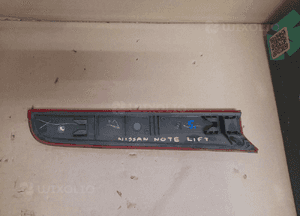 Nissan note E11 lampa prawa tył odblask 1