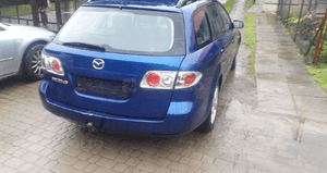 Mazda 6 02-07 Maska lampa zderzak pas atrapa 25B 8