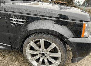Błotnik przedni prawy czarny Range Rover Sport L320 2006-09