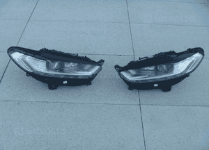 Trójkąt błotnika prawy lewy mondeo MK5 DS73-F16004 9