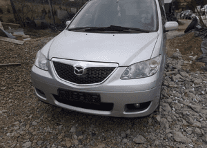 Mazda MPV 04-06 Maska lampa zderzak pas atrapa 22V 8
