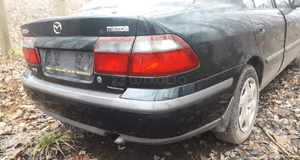 Mazda 626 GF 97-02 Zderzak tył tylny 18J 11Q 2