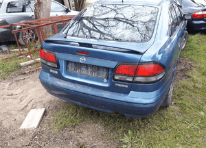 Mazda 626 GF 97-02 HB Klapa tylna tył z szyba drzwi lampa zderzak 4
